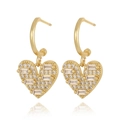 Detail of heart drop earrings in 18K gold plating with shimmering zircon pavé stones - Pave Heart Style (CXE1019)