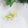 Translucent yellow acrylic butterfly hair claw clip displayed on a white ceramic plate - 4.5CM / Light Yellow