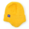 Detalle de gorro de punto amarillo con etiqueta de copo de nieve y suave forro de felpa - Amarillo