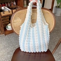 Blue and white striped bubble texture tote bag on a rustic chair - Blue & White
