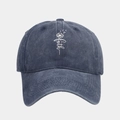 Detail of dark blue washed denim baseball cap with faith print and dandelion pattern - Navy Blue