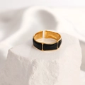 Detail of adjustable gold-plated ring with black enamel panels on textured stone - Adjustable Open / 18K Gold Plated Black Enamel