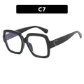 Übergroße schwarze quadratische Sonnenbrille mit goldenem Herz-Logo am Bügel - Einheitsgröße / Glänzend Schwarz Klare Gläser