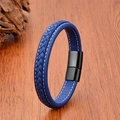 Close-up of blue braided leather bracelet with black magnetic clasp on wood background - 19cm / Blue/Black Clasp