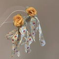 Detail of yellow fabric rose hair clips with polka dot ribbons for vacation style - 118# Silver Needle - Yellow - Green - Blue