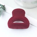 Elegant red velvet semi-circular hair claw clip for high ponytail styling on white tray - Flocked Wine Red