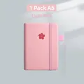 Light pink A6 portable notebook with embossed cherry blossom and elastic strap - A6 / 1 Pack - Sakura Logo / Light Pink