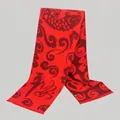 Macro detail of red wool scarf featuring koi fish patterns and fine fringe textures - 180*30cm / Ping An Koi Pattern