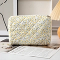 Quilted makeup bag with yellow floral pattern and zipper closure for travel - Yellow Floral (Medium)