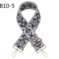 Close-up of ethnic style jacquard shoulder strap with floral embroidery and gold hardware - B10-5/Gold