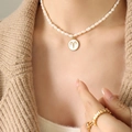 Aries zodiac freshwater pearl necklace with gold circular pendant for women - Aries