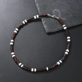 Close-up of bohemian beaded necklace with dark brown wood and white clay cylinder beads - Dark Brown Wood White Cylinder (ZJ11809)