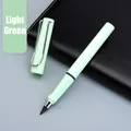 Inkless eternal writing pencil in light green finish on a black leather notebook - Small Rod HB / Light Green