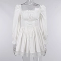 Detail of white puff sleeve lace dress featuring waist drawstring and floral hem textures - S / White
