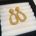 Vintage oval resin drop earrings in amber yellow color displayed in a classic jewelry box - 26# Silver Earring Post - Khaki Amber Resin Round