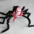 75cm plush Halloween spider featuring a spooky white skull head and poseable black legs - Floral Face Skull Spider