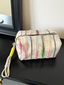 Colorful striped woven cosmetic bag with vibrant multi-color vertical patterns and handle - Handheld Khaki Multi-Color Stripes