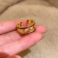 Detail of gold-plated open ring featuring hollow brand logo and red enamel inlay - Hollow Double C Style (3# Ring-Gold)