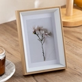 Minimalist rectangular natural wood photo frame with white floral art print inside - White Wood Grain 7 Inch