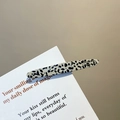 Handmade black spotted white hair clip with gold metal lettering on display card - Black and White Spots