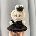 Plush doll in green flower hoodie and black pleated skirt from the party series - Black Tulip Skirt / First And Second Generation Keychains Are Compatible With La Cloth Dolls. Dolls Not Included.