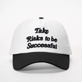 Detail shot of Take Risks to be Successful embroidery on white and black baseball cap - One Size / White and Black Splicing