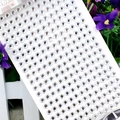 Close-up of 3mm transparent acrylic rhinestone stickers in grid layout for DIY crafts - 6mm / White