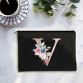 Black canvas cosmetic bag with pink floral letter V print and golden zipper detail - Letter V
