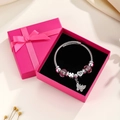 Perlenarmband mit rosa Kristallherz und Schmetterling in einer rosa Geschenkbox - Mit Schmuckschatulle / Schmetterling