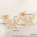 Exquisite 18k gold plated human-shaped stud earrings with AAA zircon inlay on silk background - Human Shape