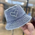 Light blue washed denim bucket hat featuring white heart embroidery detail - Light Blue / One Size(58cm)