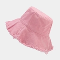 Detail shot of pink washed cotton bucket hat showing frayed edge fringe and fabric texture - One Size / Deep Pink