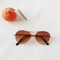 Detail view of gold metal aviator sunglasses for kids with brown gradient lenses - Tea Gradient