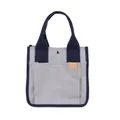 Hellgraue Canvas-Tasche mit dunkelblauen Tragegriffen und praktischer Außentasche - Grau/Blau