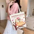 Off-white canvas tote bag featuring a cute owl graphic and shoulder carry fit - Dorky Bird