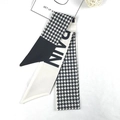 Elegant houndstooth ribbon hair tie with RAIN letter print in black and white - Houndstooth