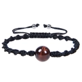 Adjustable black woven rope bracelet with a round tiger eye bead and silver metal accents - Red Tiger Eye Bracelet