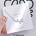 Detail of tulip pendant with zircon petals, white pearl and green marquise gem on silver chain - 1184 Five-Petal Flower Green Gemstone Necklace