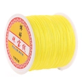 DIY yellow jewelry cord size 72 neatly wound on a white spool for handmade bracelets - Yellow