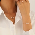 Minimalistisches Perlen-Halsketten- und Armband-Set mit Goldperlen an elegantem Modell - Perlen und Goldperlen Minimalistischer Stil