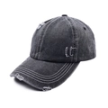 Detail of washed black denim baseball cap featuring vintage distressed ripped texture - One Size(Adjustable) / Black (Distressed Hole)