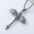 Detail of gothic silver cross wing pendant with gear element and industrial steel texture - Gear Wing Cross Style