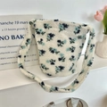 Floral print lamb wool bucket bag with blue and green patterns and wide shoulder strap - Floral Blue