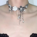 Close-up of Y2K gothic choker with silver flower, metal studs, and pearl tassel details - Pearl Tassel Necklace