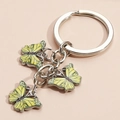 Golden yellow butterfly keychain pendant with metallic chain and ring for handbags - Earthy Yellow