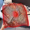 Detail of red paisley silk-like square scarf on white faux fur background - 70*70cm / Red Paisley