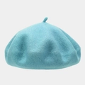 Detail of light blue wool beret featuring a classic top stem and soft felt texture - One Size / Lake Blue