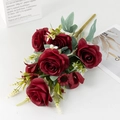 Artificial deep red rose bouquet with white flowers and green leaves on white background - Red