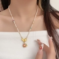 Elegant pearl necklace with golden koi fish clasp and vintage enamel pendant detail - Koi Vintage Enamel Pendant Artificial Pearl Necklace (X4649)