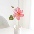 Handmade crochet small pink flower bouquet with green leaves in a white ceramic vase - Tung Flower Pink